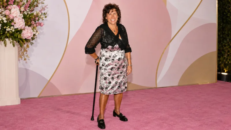 Janis Winehouse meeting young people at a Camden charity tribute event