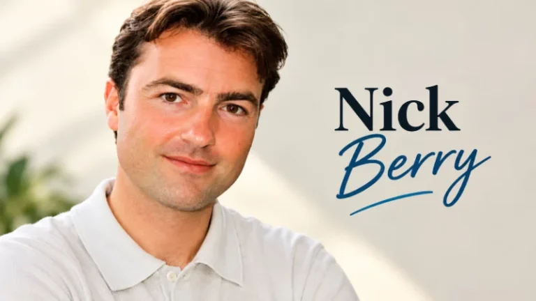 Nick Berry in a 1960s police constable uniform beside a motorbike on a country road